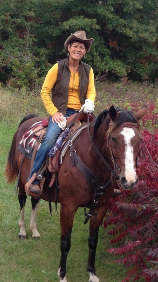Perri riding a horse